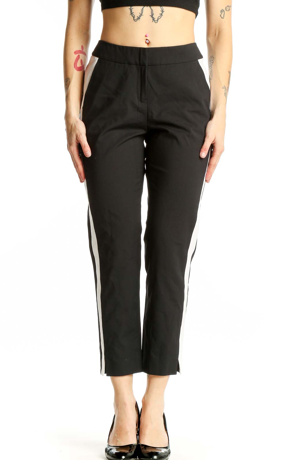 Front view of black cropped trousers with white side stripes