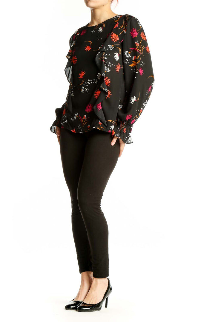 Front view of Aqua black floral print long sleeve blouse