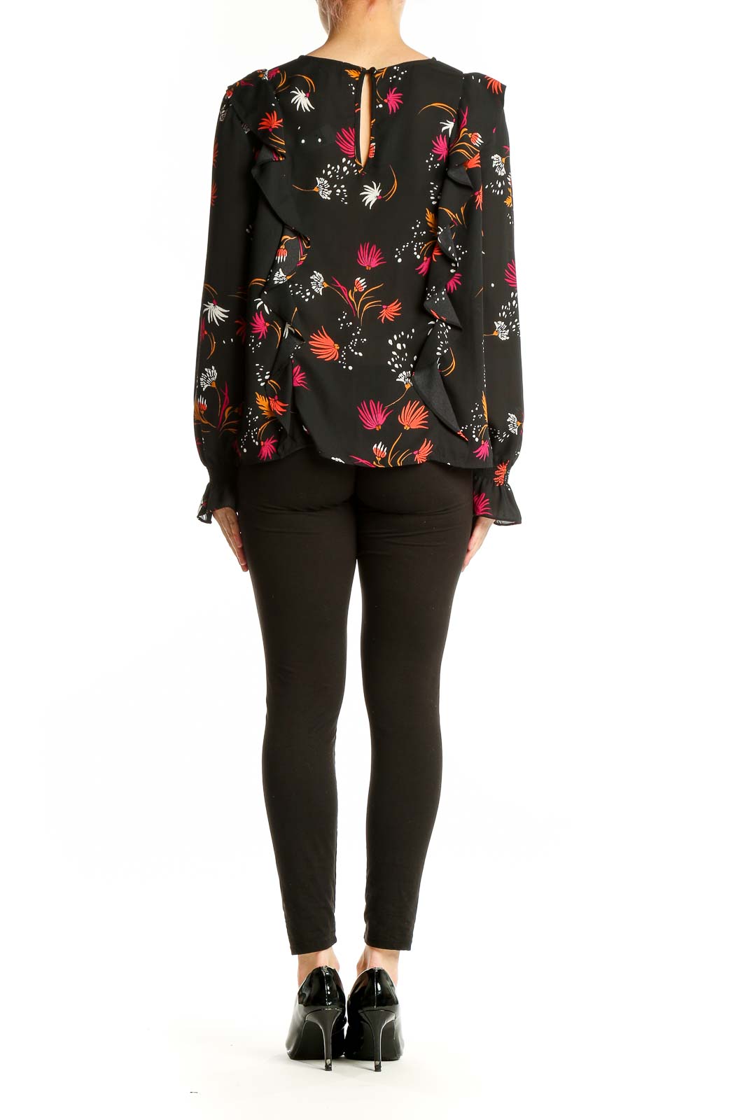 Back view of Aqua black floral print long sleeve blouse on model