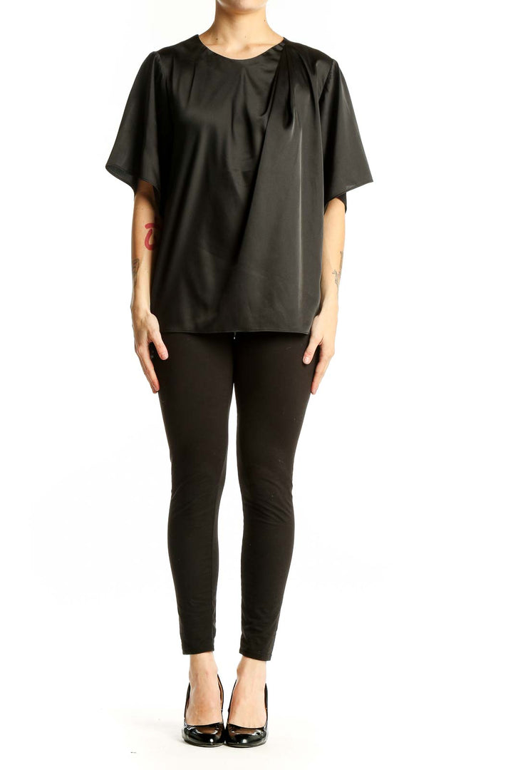 Front view of black Banana Republic blouse with flowy sleeves