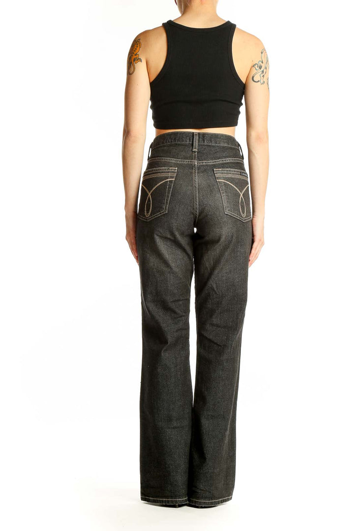 Back view of Calvin Klein Jeans dark gray wide-leg denim jeans on model