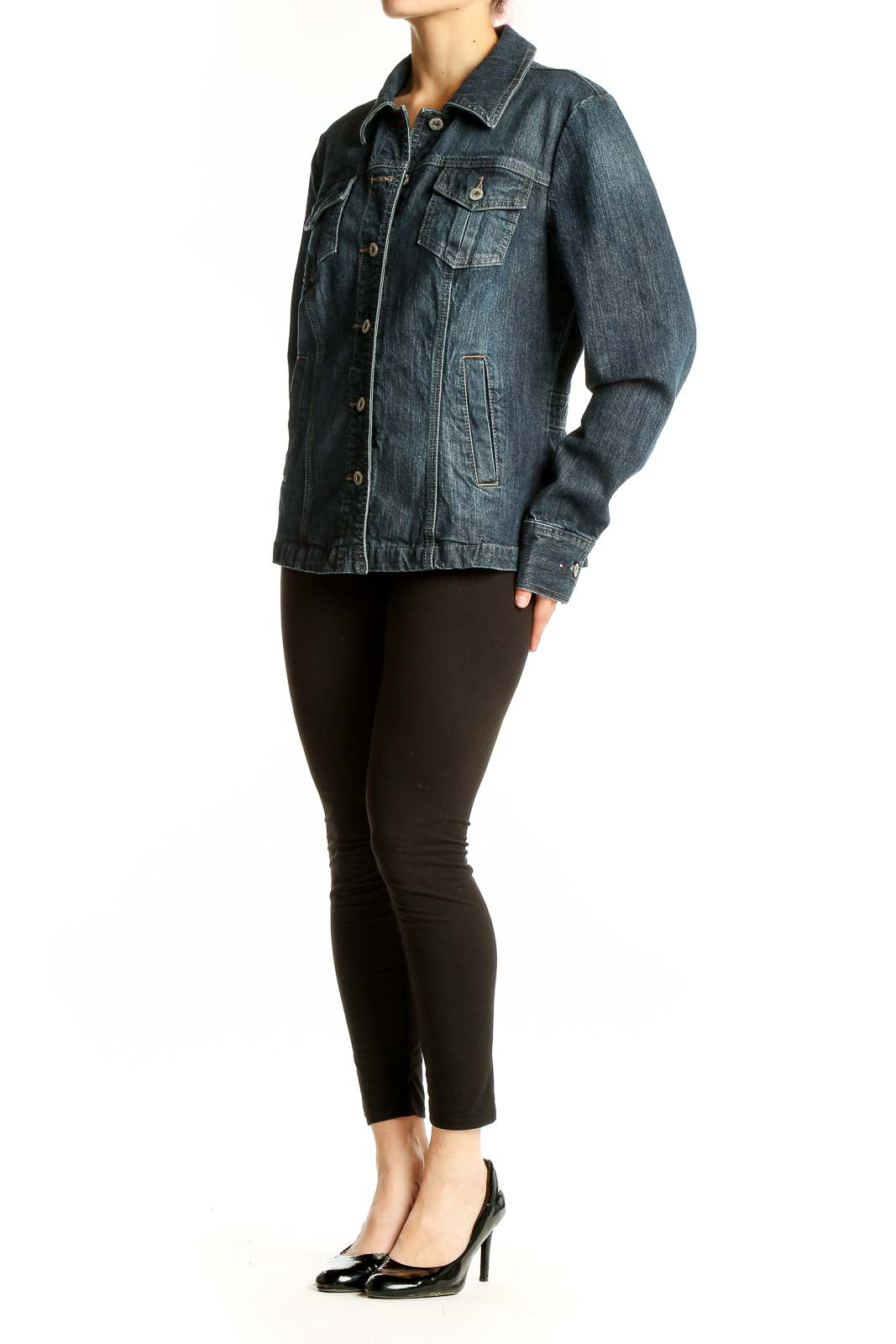 Front view of Tommy Hilfiger dark blue denim jacket with button-up closure and chest pockets