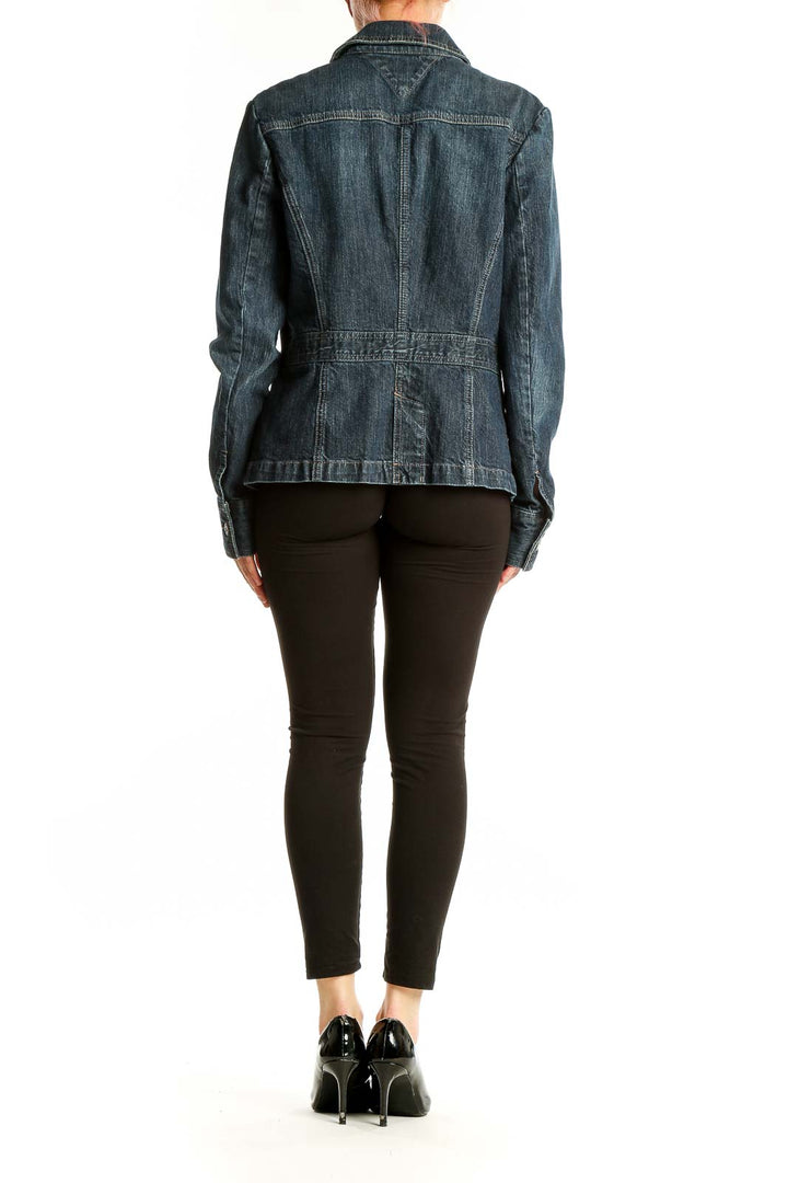 Back view of Tommy Hilfiger dark blue denim jacket showing classic cut and stitching details