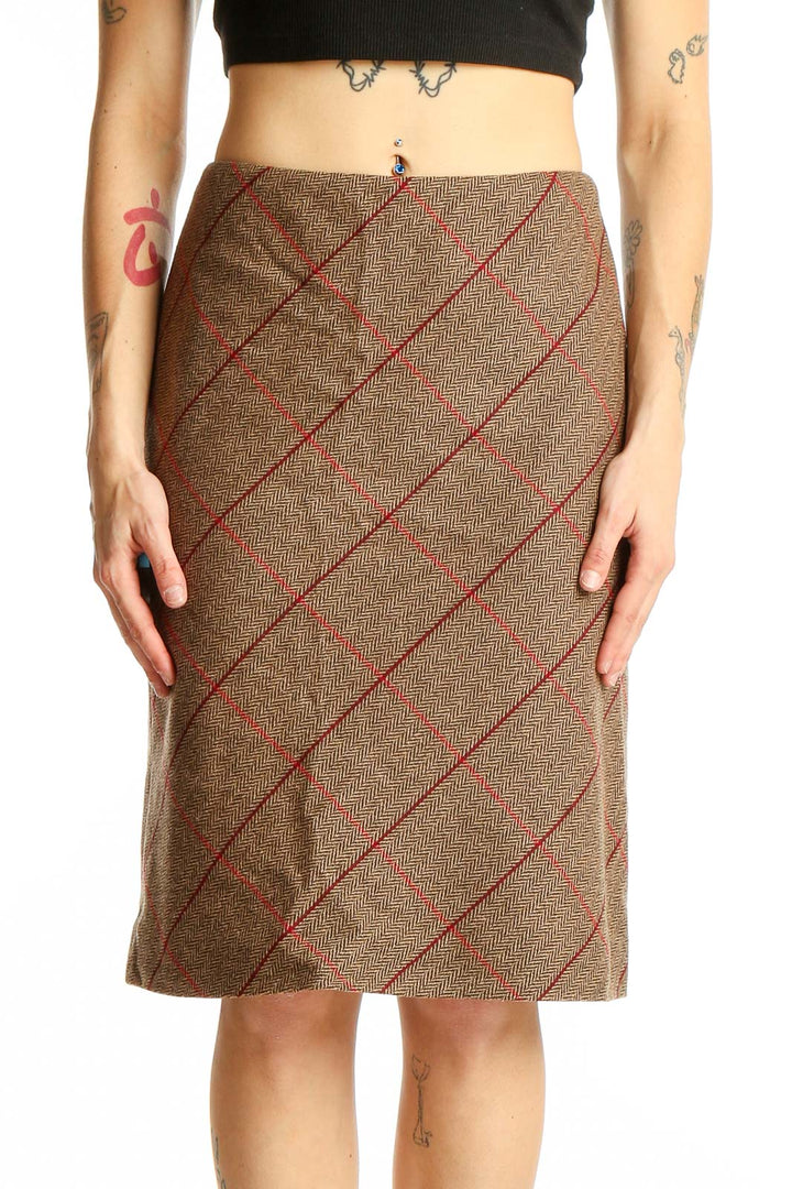 Front view of Ann Taylor LOFT brown plaid pencil skirt with red diagonal lines