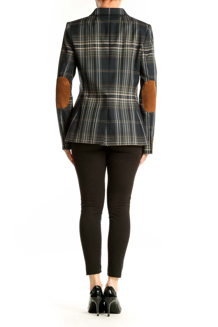 Side view of Tommy Hilfiger navy plaid blazer showing tailored fit and long sleeves