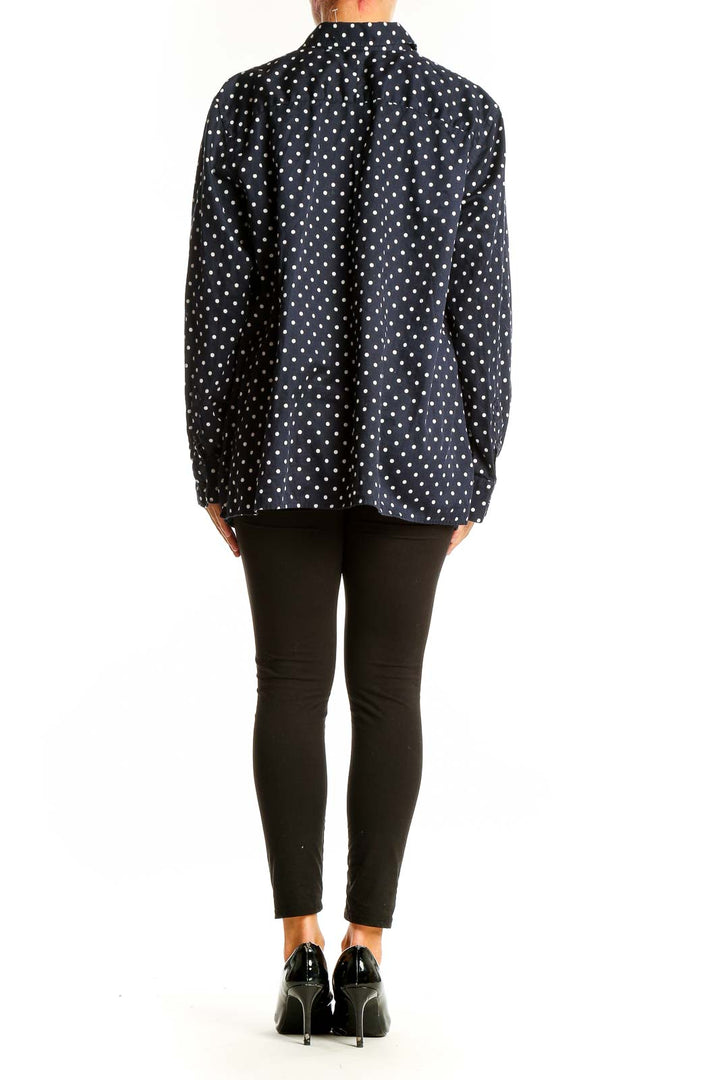 Back view of Lauren Ralph Lauren navy polka dot button-up shirt