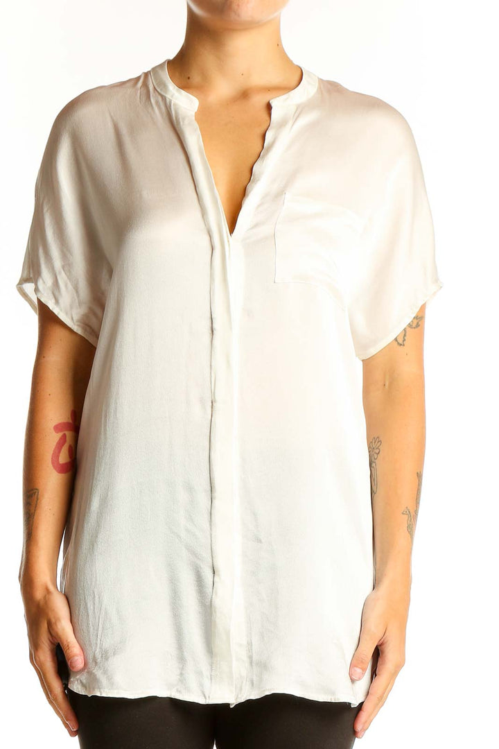 Front view of Vince white silk short-sleeve blouse