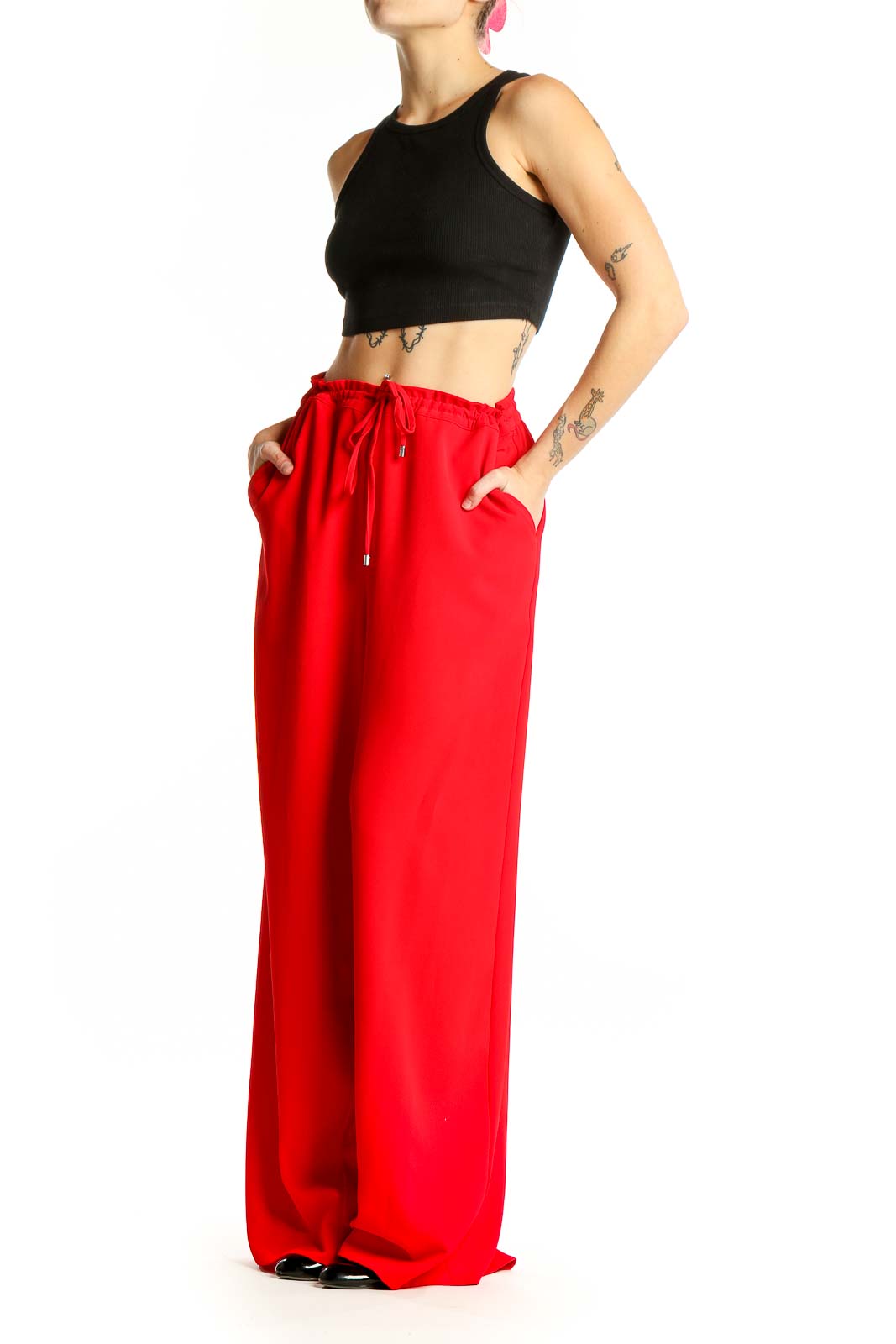 Front view of red DKNY wide-leg pants with drawstring waist