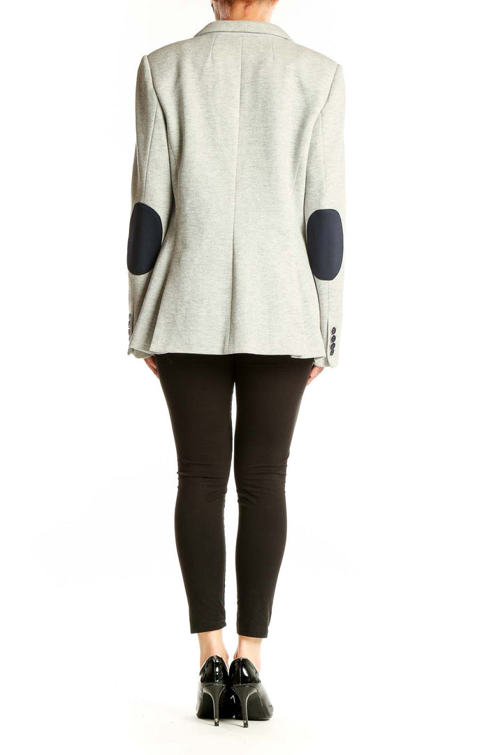 Back view of light gray Tommy Hilfiger blazer showing tailored fit and clean lines