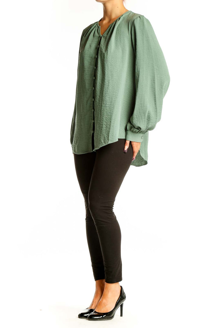 Front view of Nine West sage green button-front long sleeve blouse