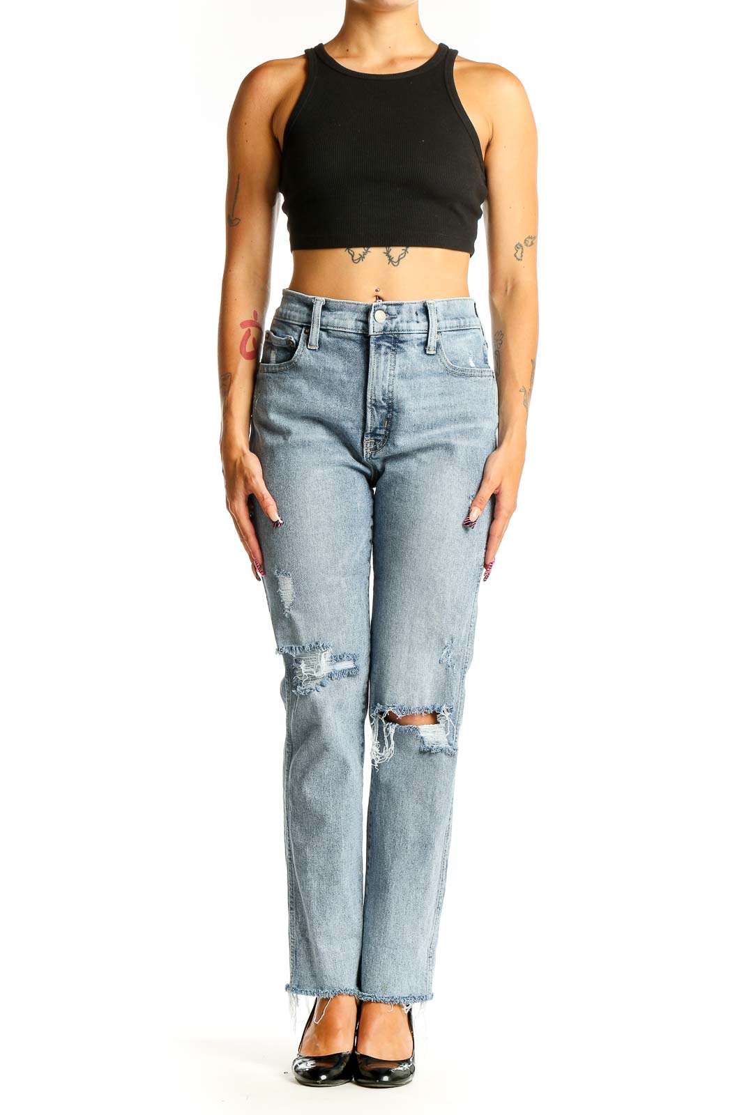 Front view of Mother light blue distressed straight leg jeans on model