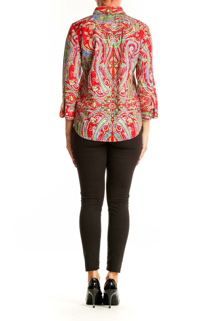 Back view of Lauren Ralph Lauren red paisley cotton button-up shirt on model with black pants