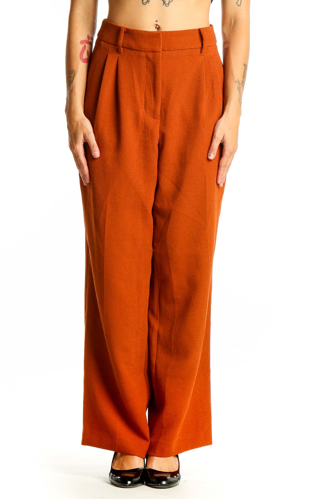 Front view of burnt orange wide-leg trousers from Nine West