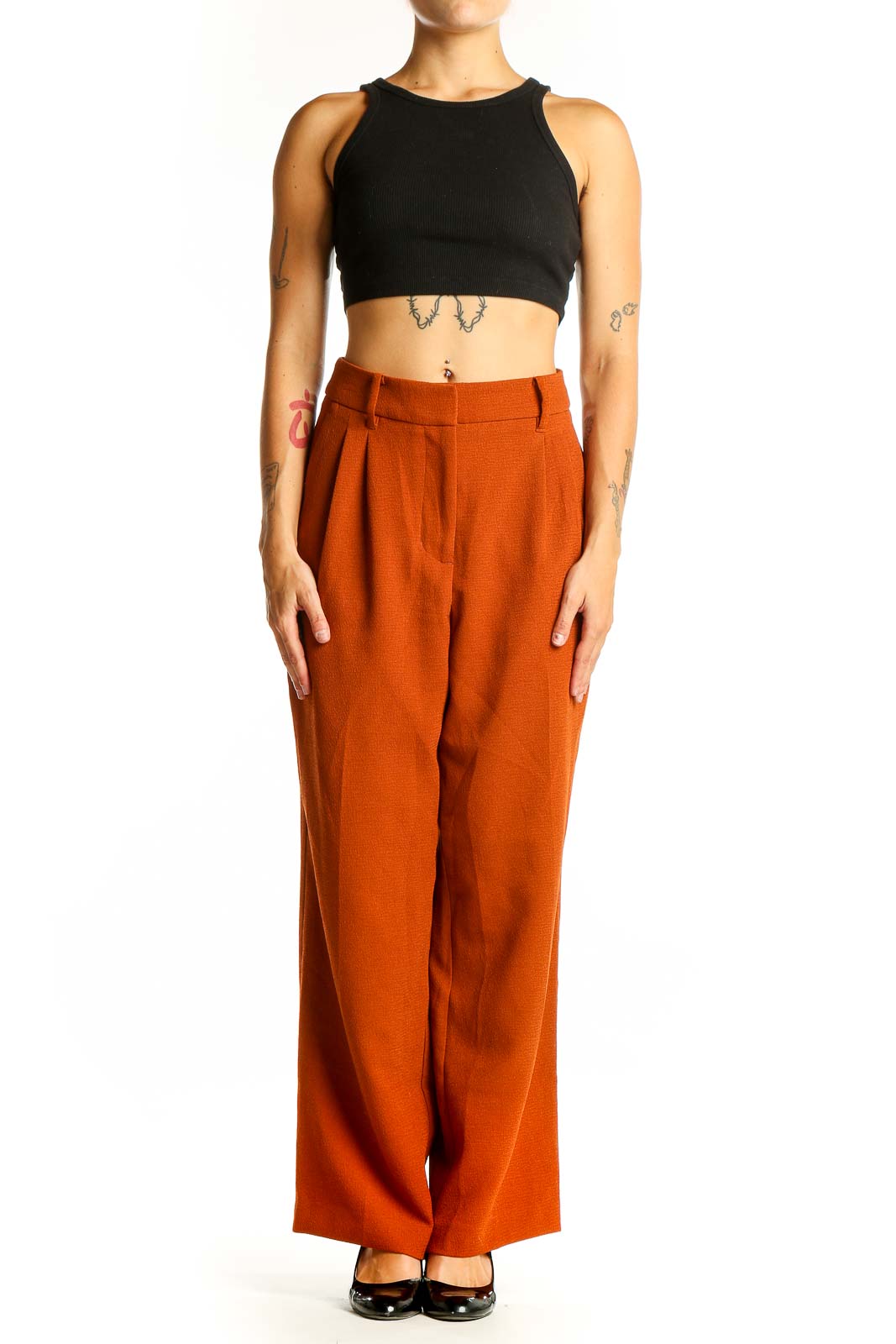 Front view of burnt orange wide-leg trousers from Nine West