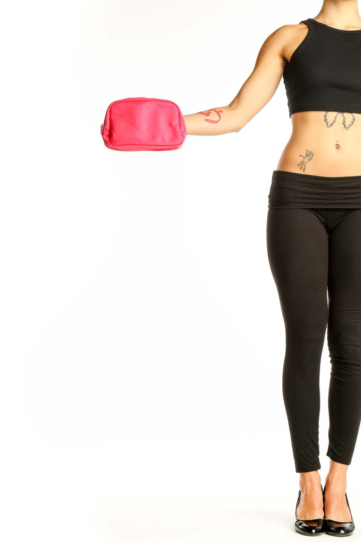 Front view of pink compact crossbody bag by SilkRoll