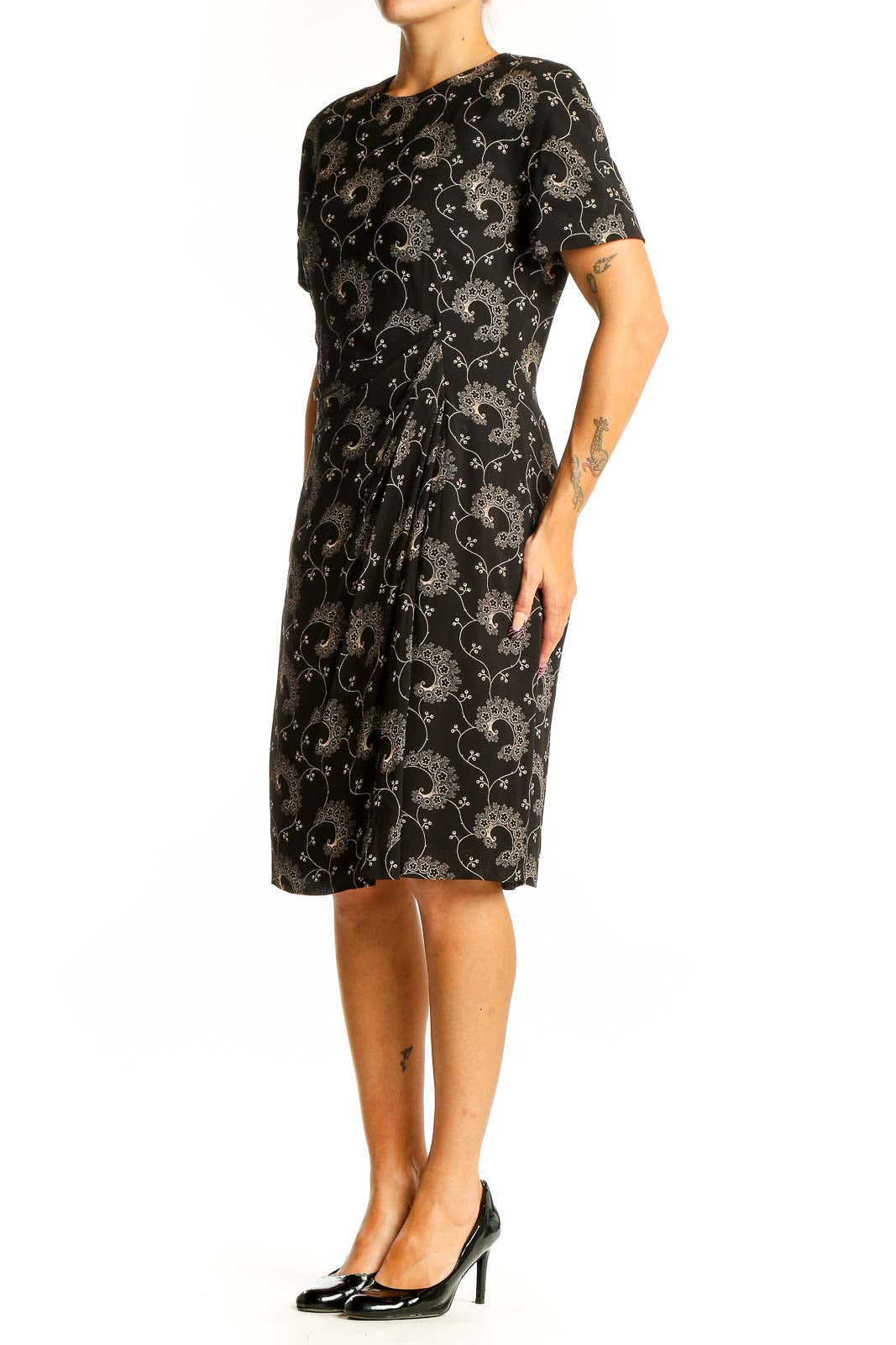 Front view of Tahari black sheath dress with floral embroidery