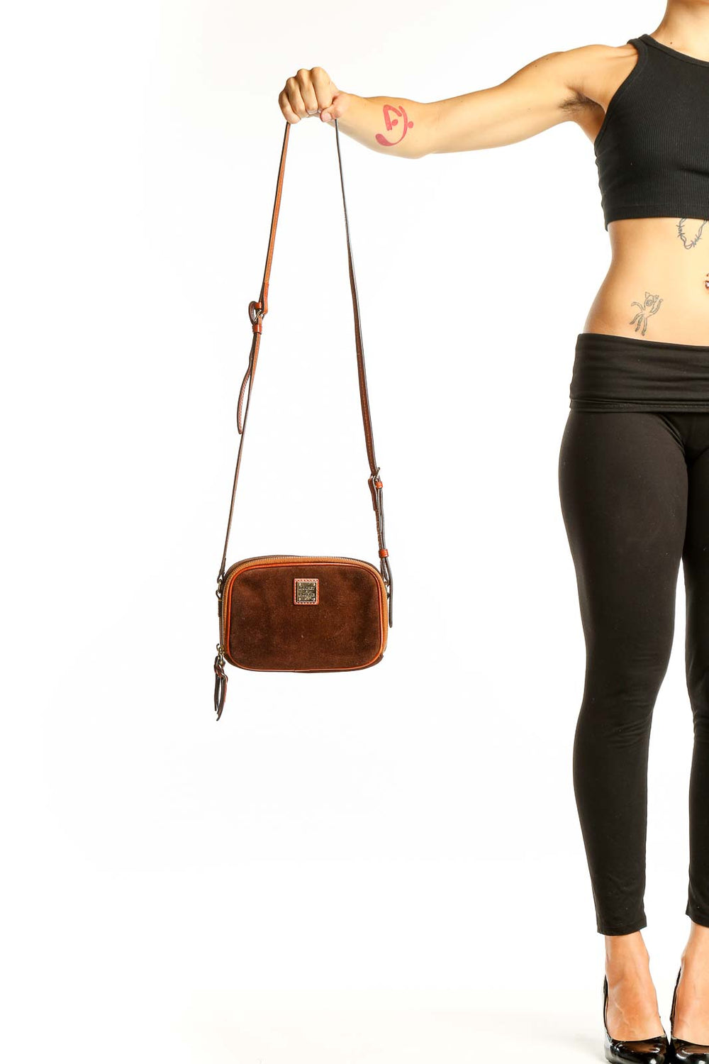 Front view of Dooney & Bourke brown suede leather crossbody bag