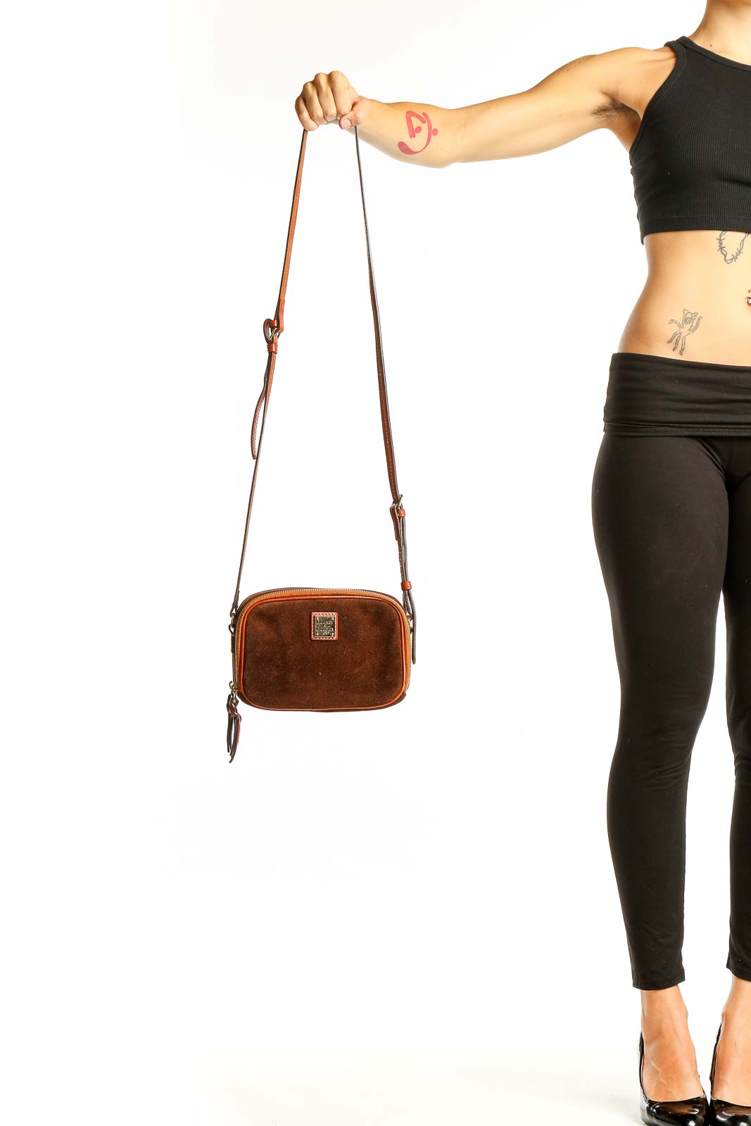 Front view of Dooney & Bourke brown suede leather crossbody bag