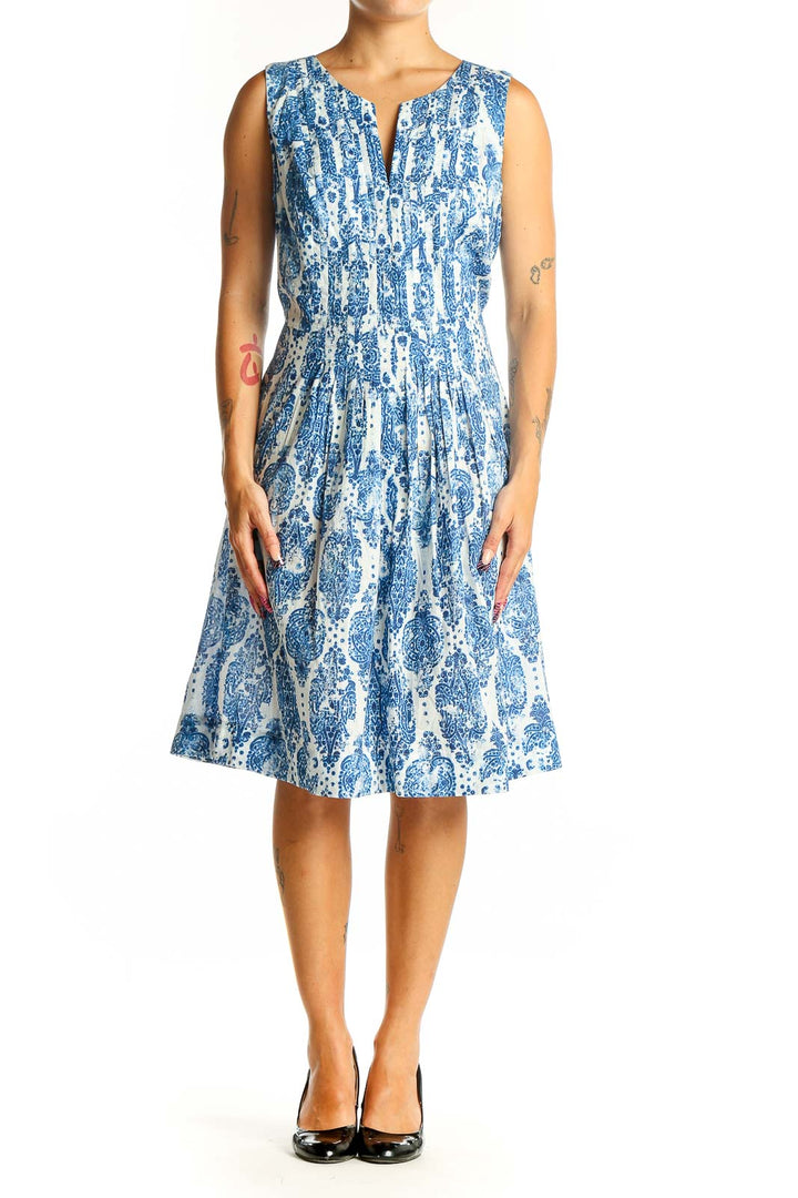 Front view of NYDJ blue and white floral sleeveless dress with A-line silhouette