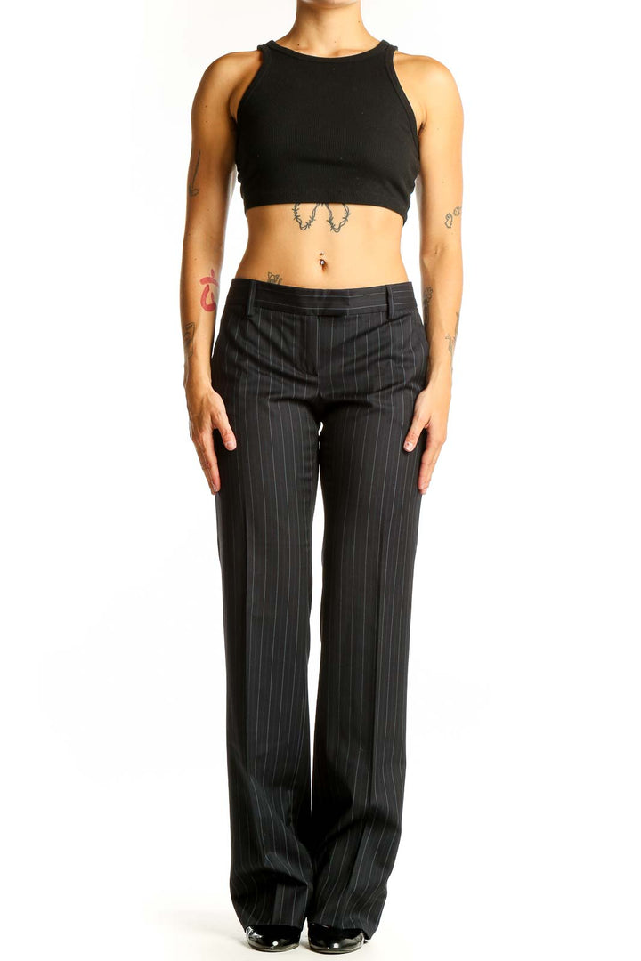 Front view of Massimo Dutti black pinstriped wide-leg trousers