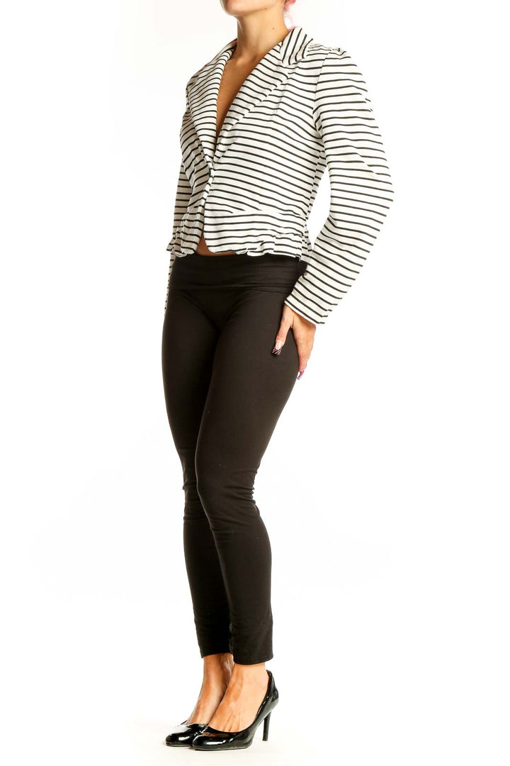 Front view of Cartonnier white striped cropped blazer with single-button closure