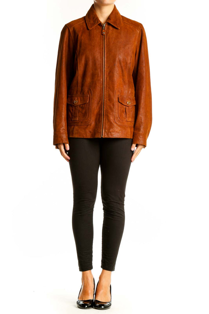 Front view of brown genuine leather zip-up jacket from The Territory Ahead