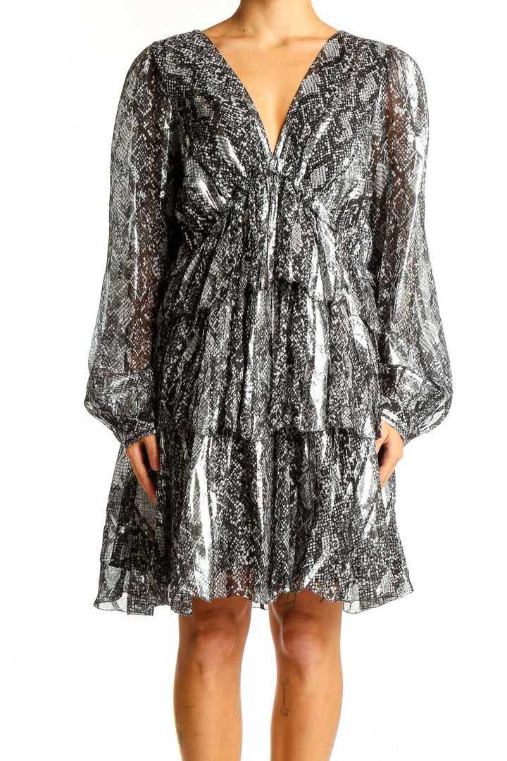 Front view of MICHAEL Michael Kors silver metallic snakeskin print cocktail dress with V-neck and tiered ruffles