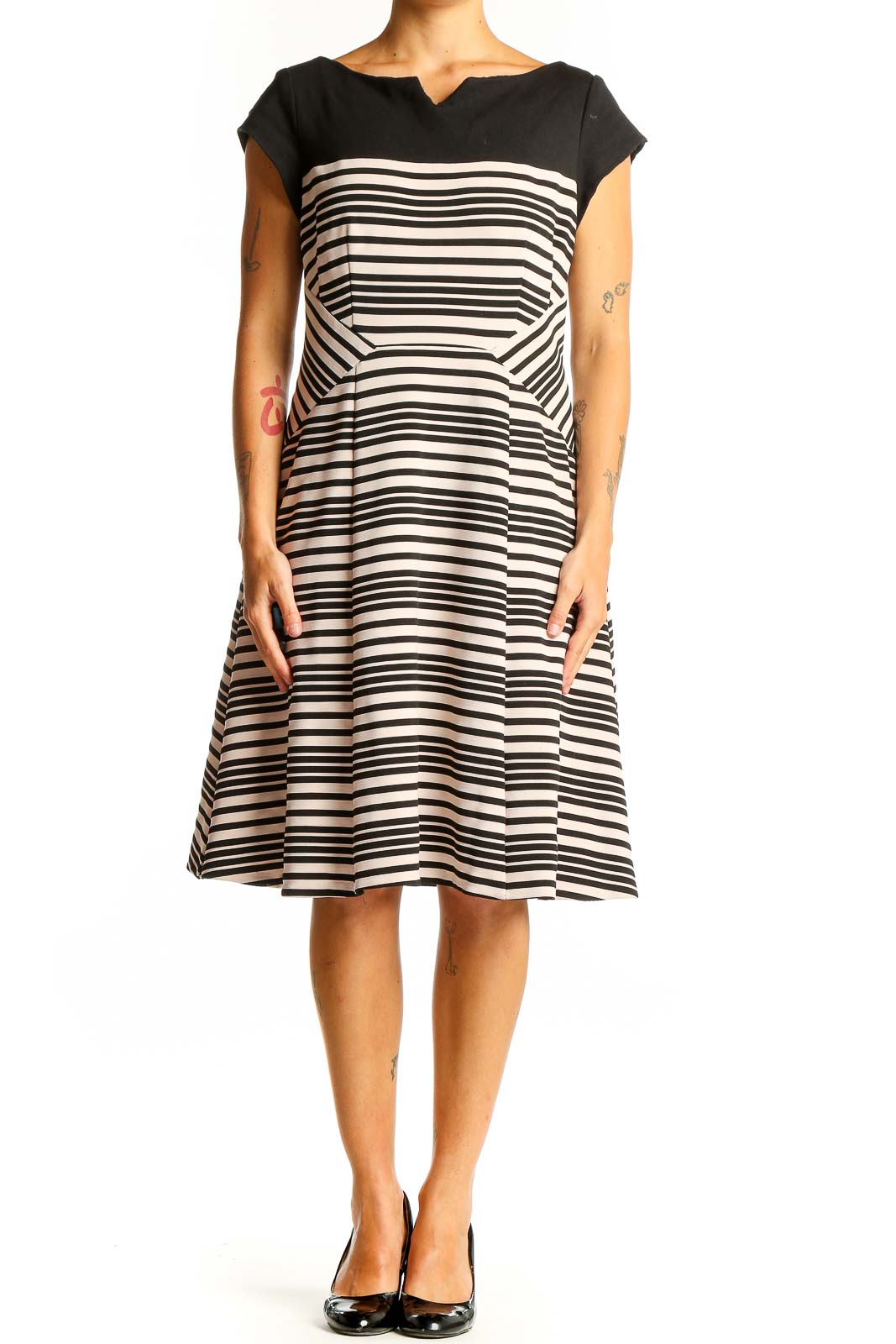Front view of Nanette Lepore black and white striped fit-and-flare dress with boat neckline