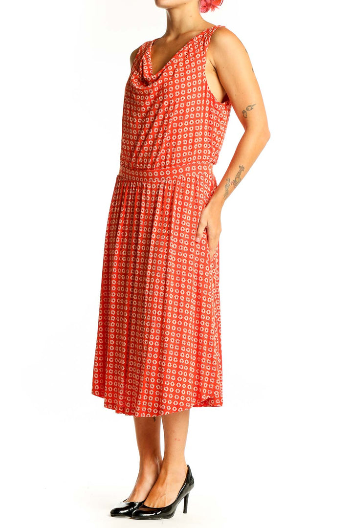 Front view of Maeve red geometric print midi dress with cowl neck