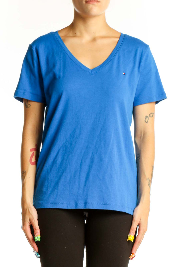 Front view of blue Tommy Hilfiger V-neck T-shirt on model