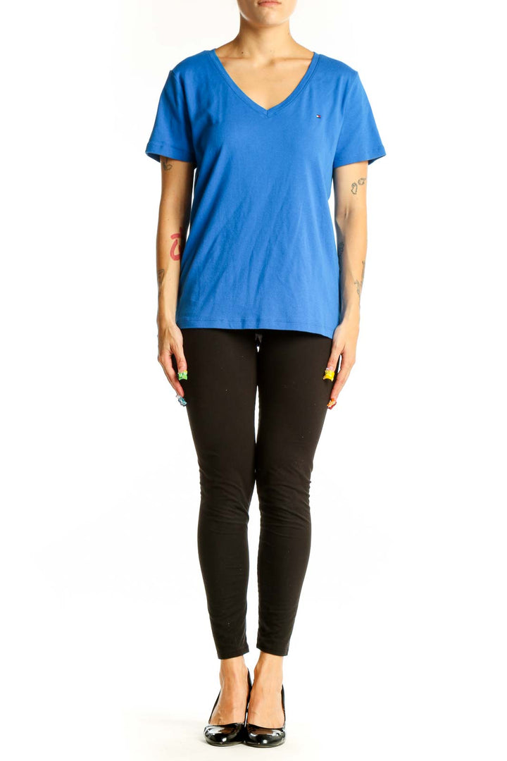 Front view of blue Tommy Hilfiger V-neck T-shirt on model