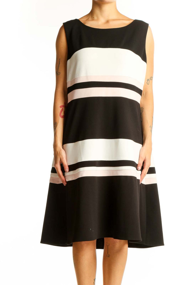 Front view of Tommy Hilfiger black and white striped A-line midi dress