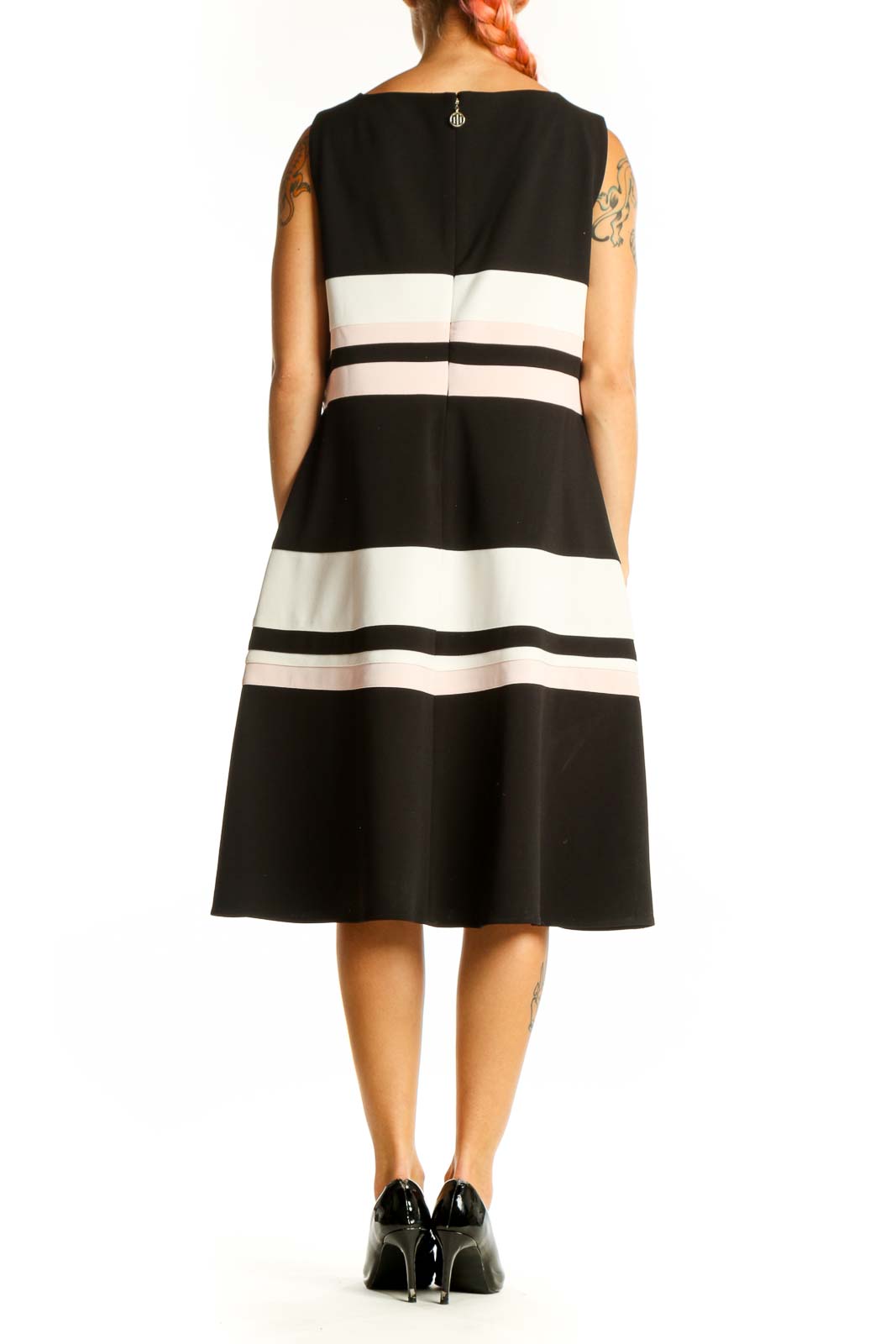 Side view of Tommy Hilfiger black and white striped A-line midi dress
