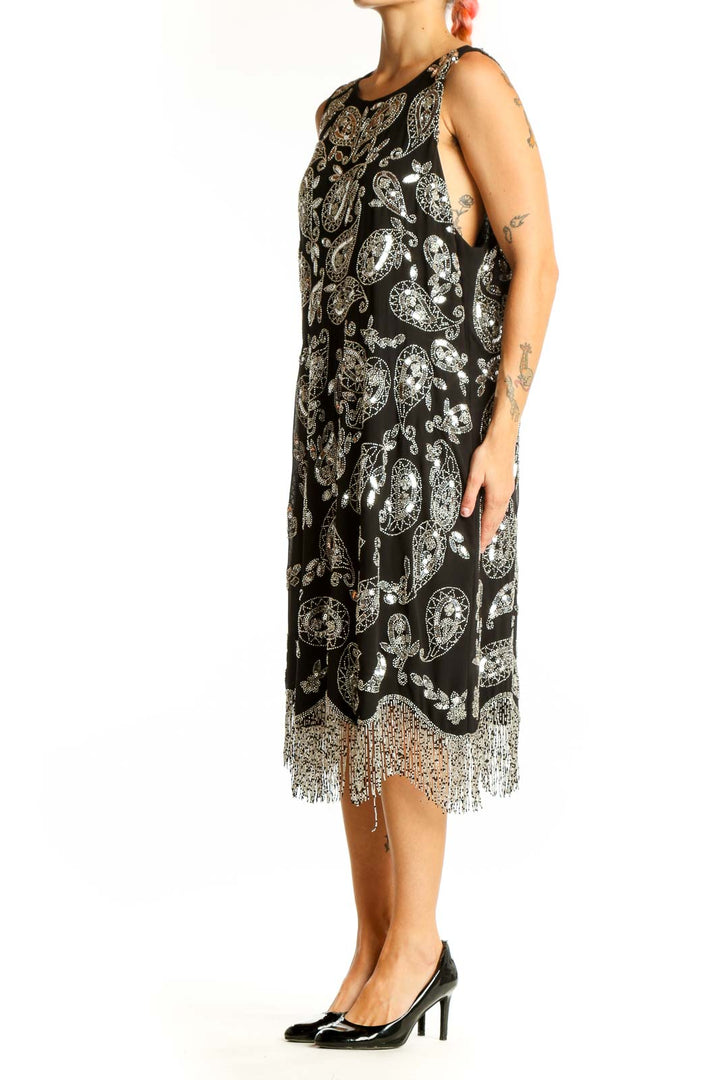 Front view of MICHAEL Michael Kors Black Paisley Print Sleeveless Midi Dress with beaded fringe hem