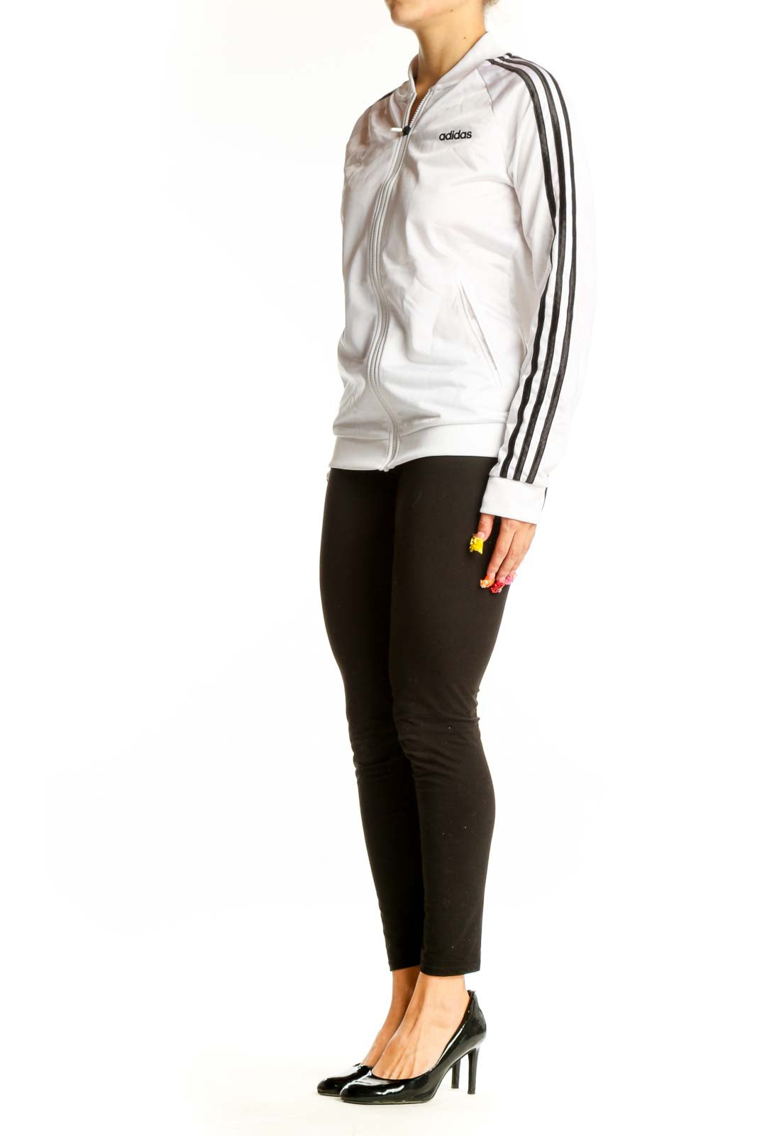 Front view of white Adidas track jacket with black stripes
