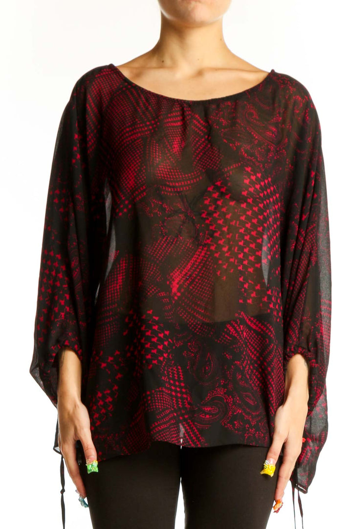 Front view of MICHAEL Michael Kors red and black patterned sheer blouse with batwing sleeves