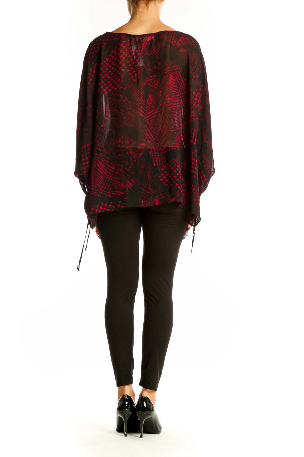 Side view of MICHAEL Michael Kors red and black patterned sheer blouse showing flowy silhouette