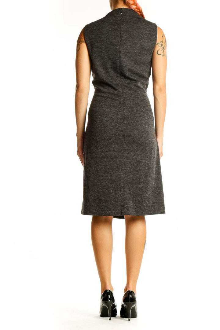 Side view of Lauren Ralph Lauren charcoal sleeveless sheath dress showing silhouette