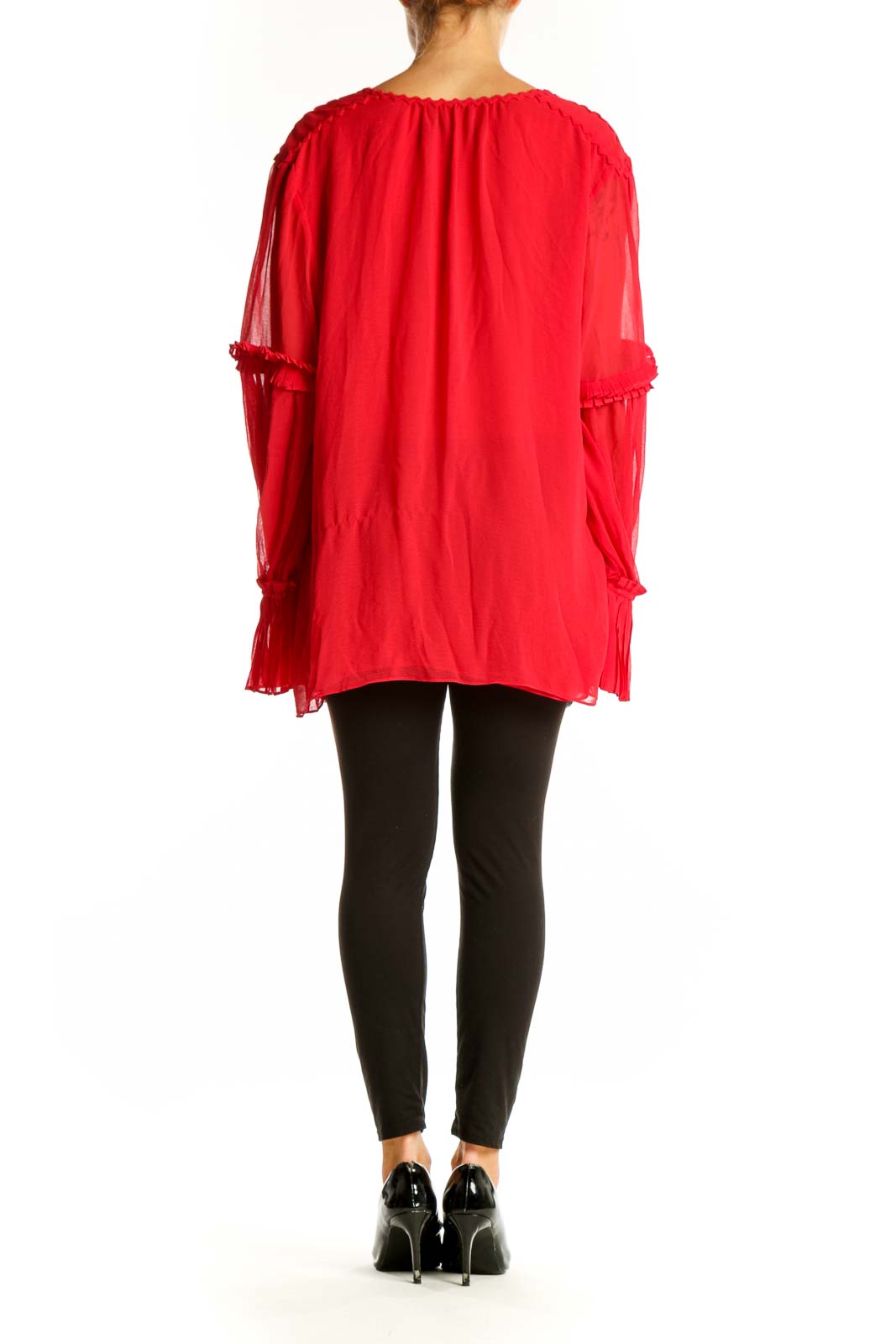 Side view of red Max Studio blouse showing flowy silhouette and long sleeves