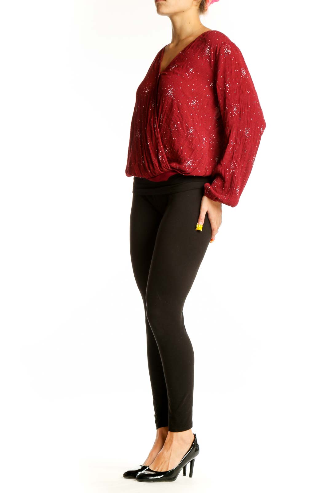 Front view of red sparkly wrap blouse with long sleeves