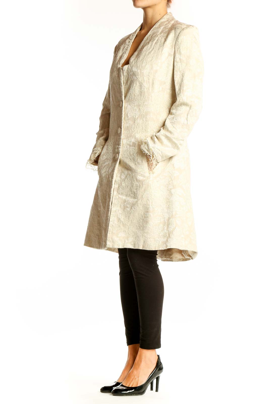 Front view of cream textured Nicole Miller long coat with V-neckline and button closure