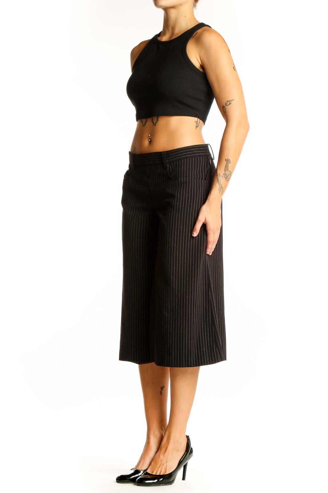 Front view of BCBG MaxAzria black pinstriped cropped wide-leg trousers on model