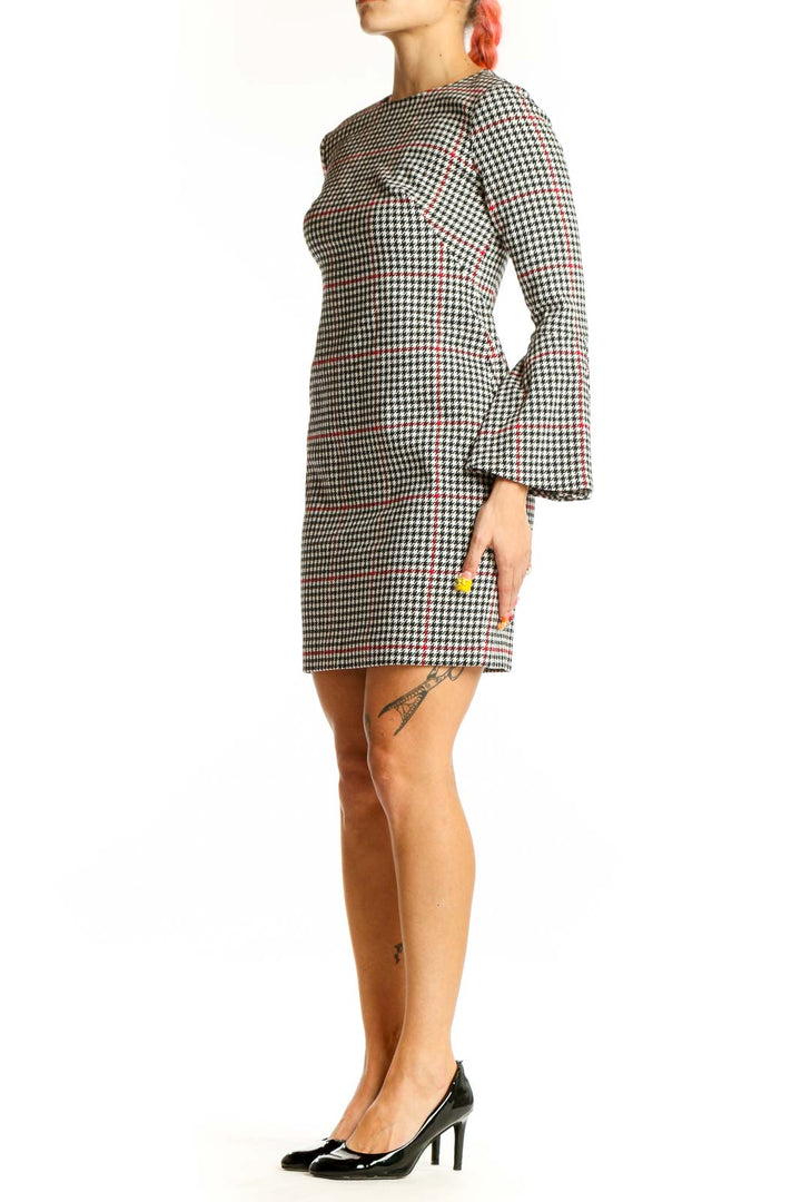 Front view of Lauren Ralph Lauren houndstooth mini dress with bell sleeves