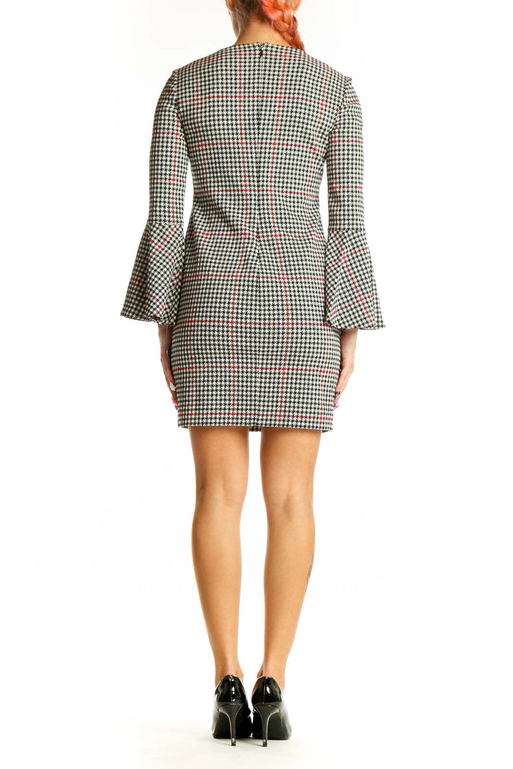 Side view of Lauren Ralph Lauren houndstooth mini dress showing bell sleeve detail
