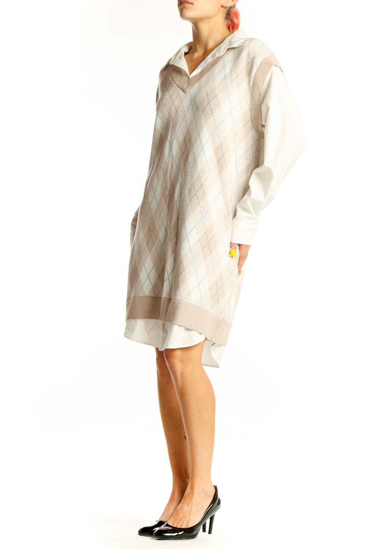 Front view of cream argyle v-neck sweater dress by Max Studio