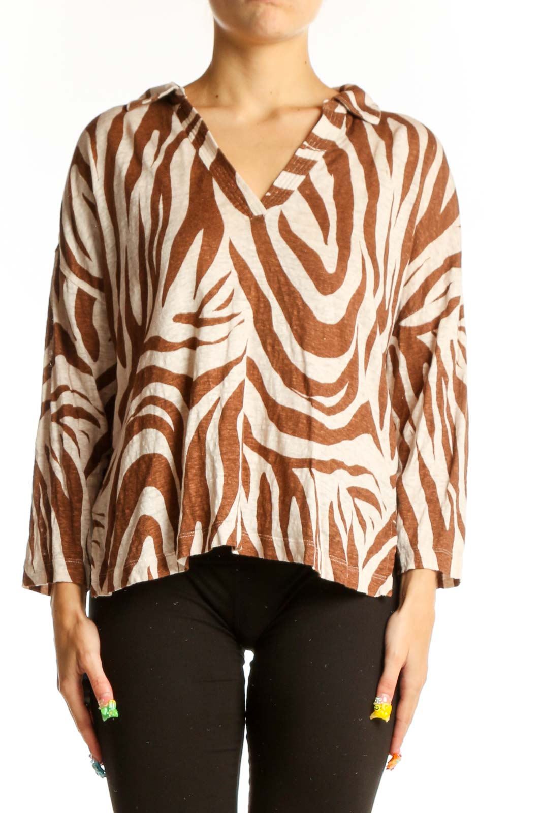 Front view of Tahari brown and cream zebra print linen top with V-neckline