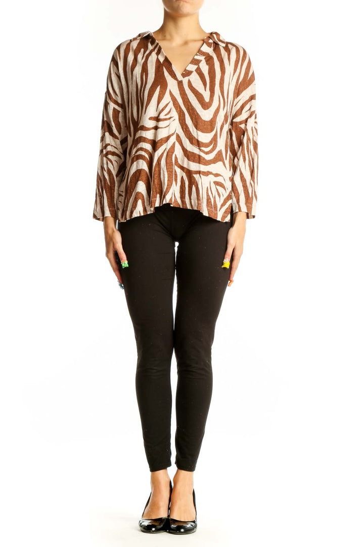 Front view of Tahari brown and cream zebra print linen top with V-neckline