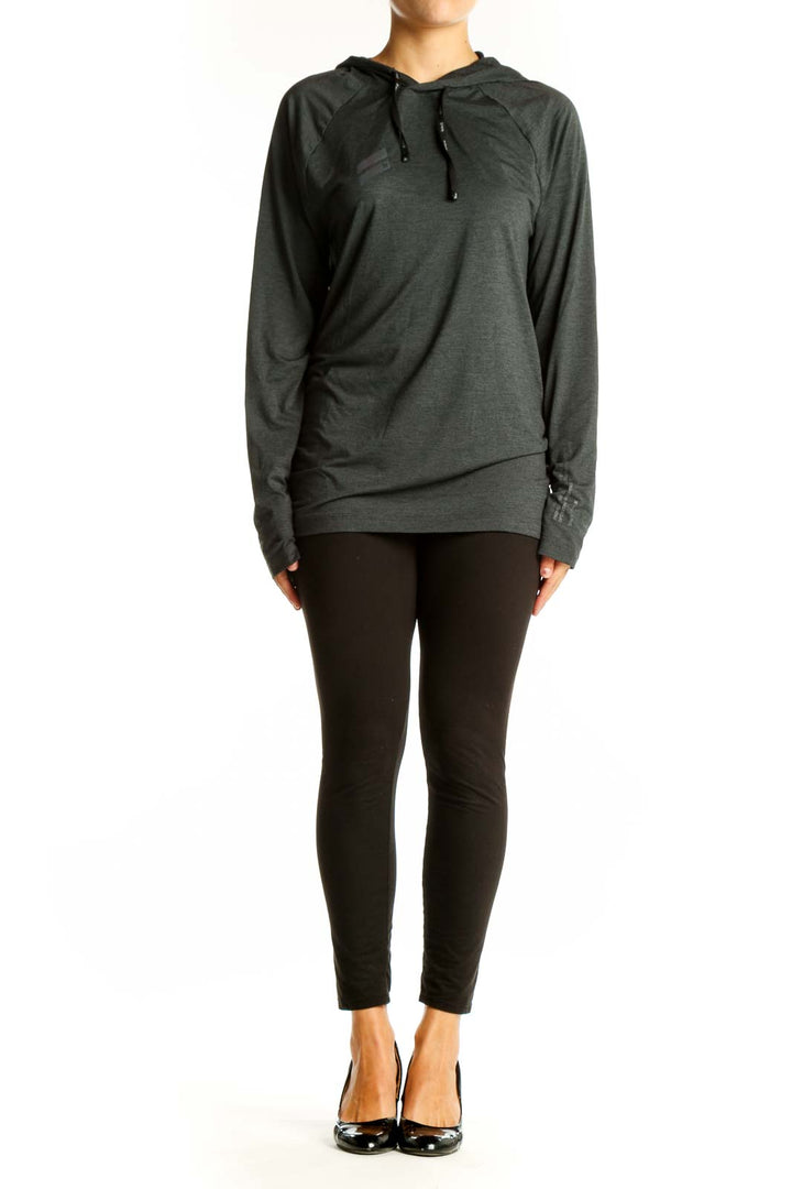 Front view of Hurley X charcoal gray hooded activewear top