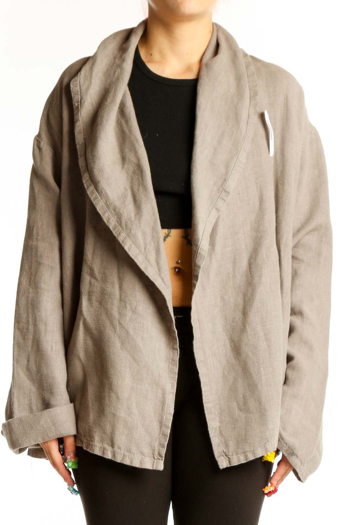 Front view of Bryn Walker beige cotton oversized jacket with shawl collar