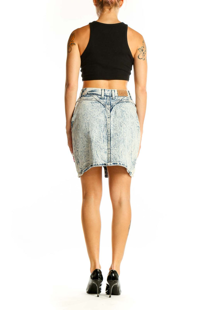 Back view of Lee acid wash denim mini skirt showing fit and length